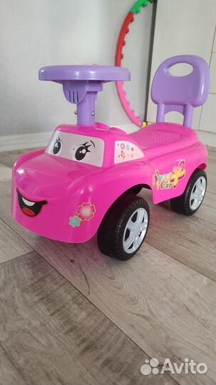 Детская машинка каталка с музыкой