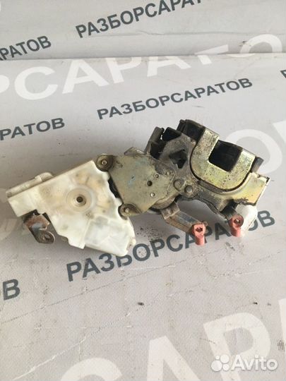 Замок двери задний левый Nissan Almera N16 хэтчбек