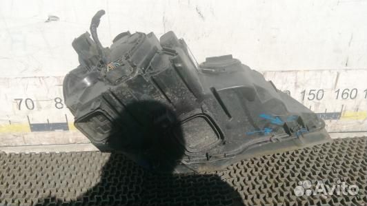 Фара левая BMW X5 E70 (1NT04MR01)