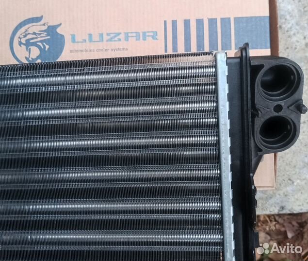 Радиатор отопителя на Рено Логан