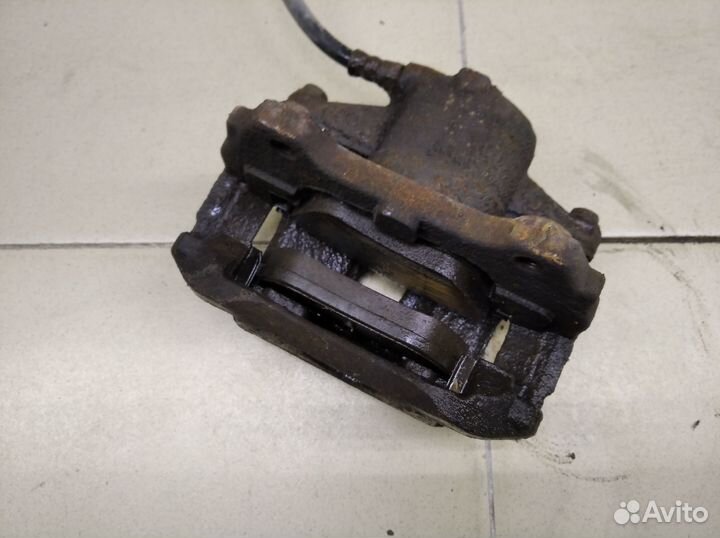 Суппорт передний левый Doblo 2005-2015