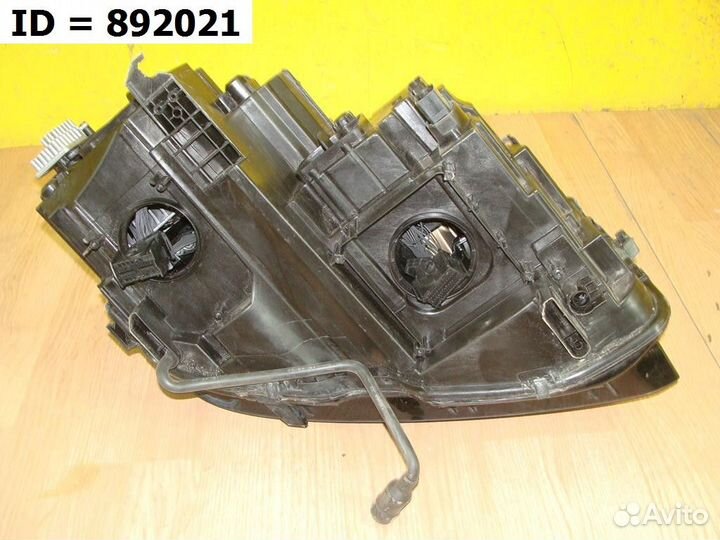 Фара левая Volkswagen Tiguan