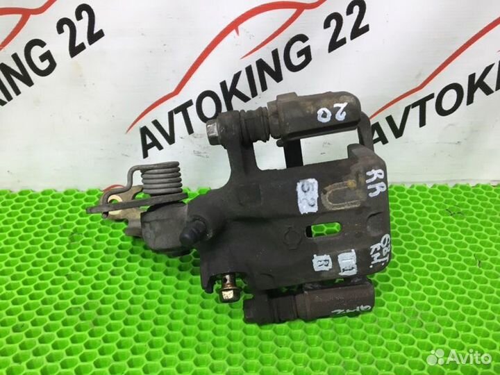 Суппорт тормозной задний правый Nissan Primera