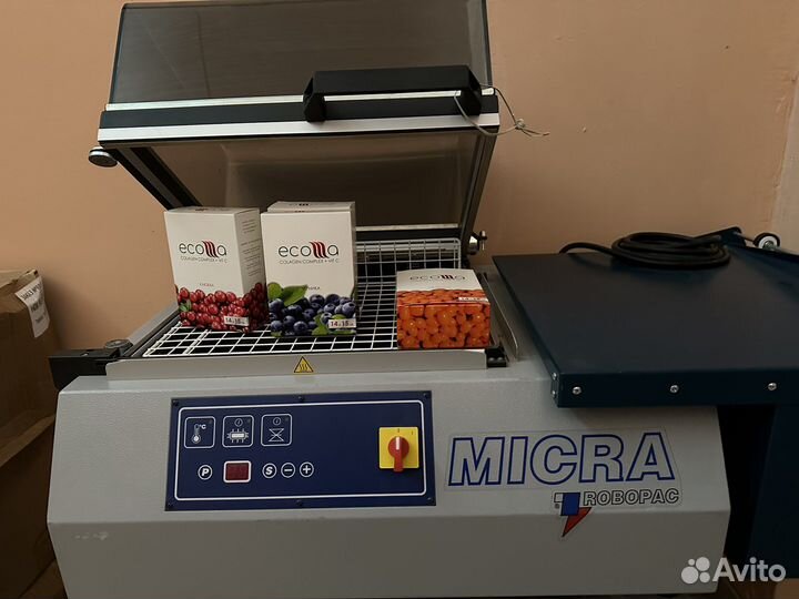 Упаковка в термоусадочную пленку коробок, банок