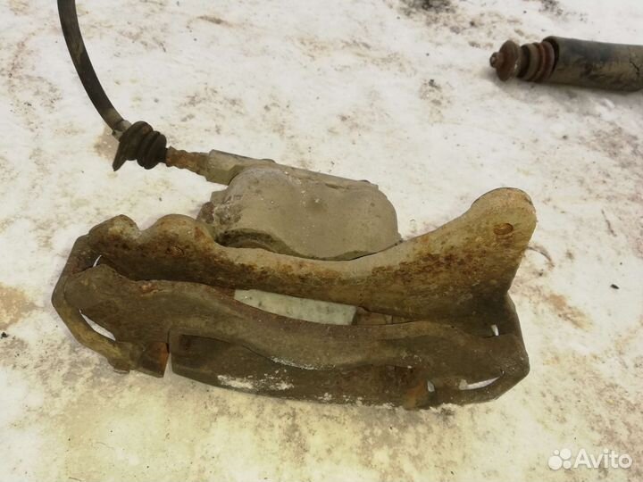 Суппорт тормозной передний Нива Шевроле