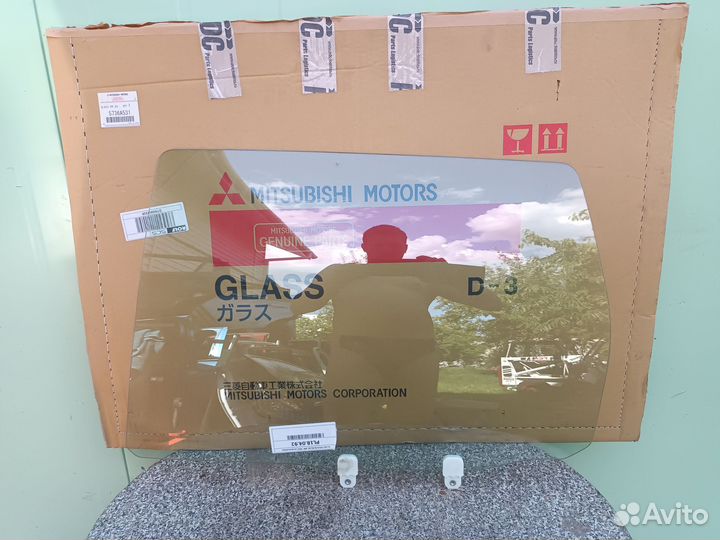 Стекло двери задней левой Митцубиси Аутленднр хл