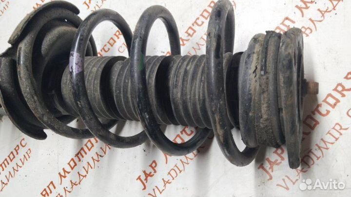 Амортизатор подвески передний Mazda 3 Bk седан 1.5