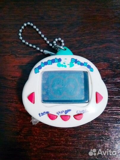 Тамагочи rakuraku dinokun tamagotchi