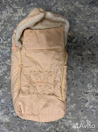 Меховой конверт в коляску