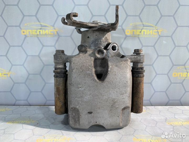 Суппорт тормозной задний левый Opel Insignia A