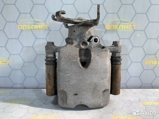 Суппорт тормозной задний левый Opel Insignia A