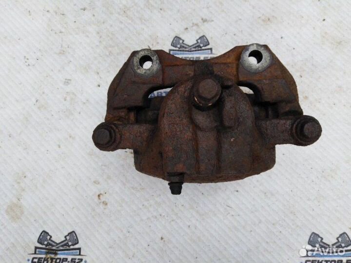 Суппорт тормозной передний правый Nissan Almera N1