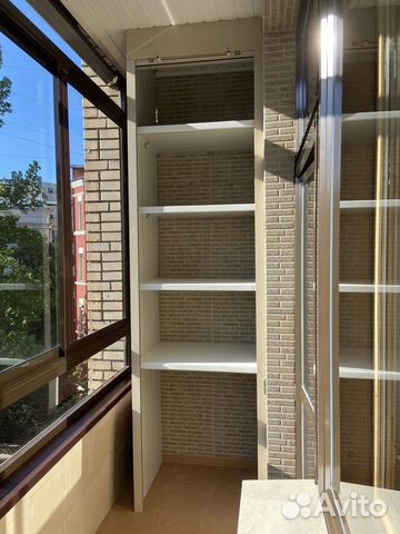 Шкаф с рольставнями на балкон на заказ