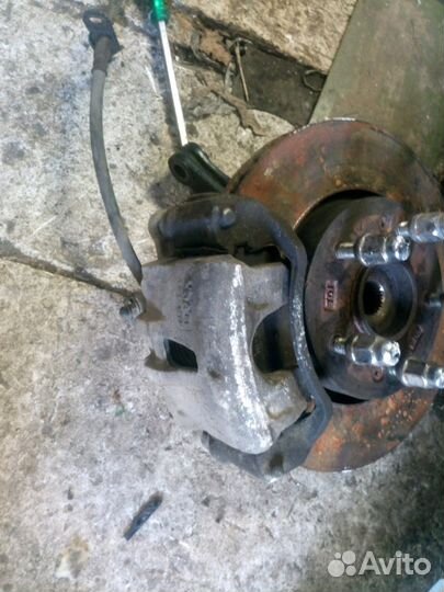 На киа церато 2 суппорт тормозной передний левый