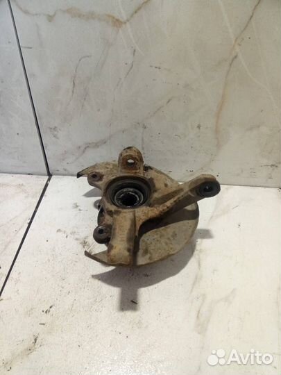 Кулак передний левый Nissan Sunny Y10 1991 NET