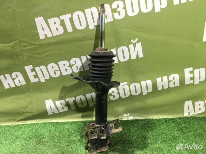 Стойка подвески передняя правая Nissan Bluebird