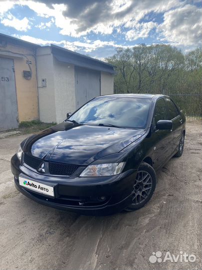 Mitsubishi Lancer 1.6 AT, 2009, 320 000 км