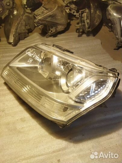 Фара левая Suzuki Grand Vitara