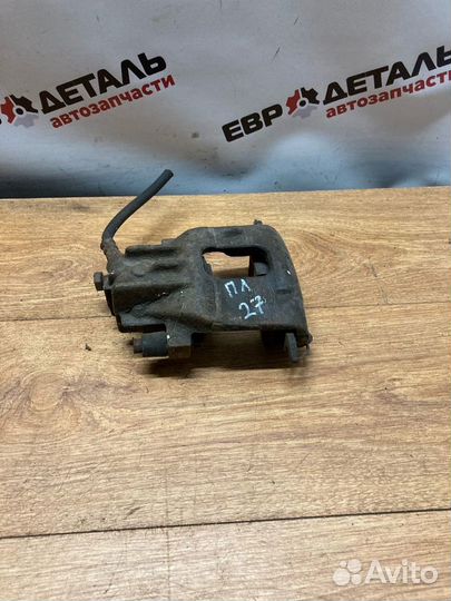 Суппорт тормозной передний левый Focus 1