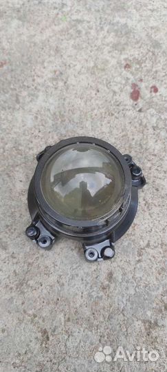 Линза в фару subaru