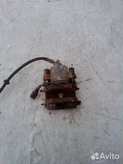 Суппорт левый Шкода Октавия Тур Skoda Octavia Tour