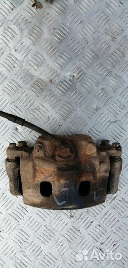 Суппорт тормозной передний левый Ford Ranger 2014