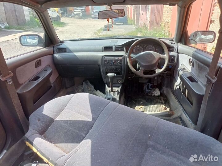 Салон Nissan Sunny B14