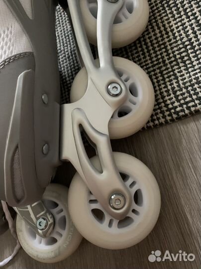 Роликовые коньки