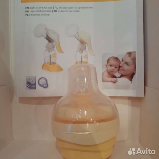 Молокоотсос ручной Medela, бутылочки, пакеты