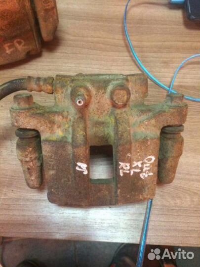 Суппорт тормозной задний левый Mitsubishi