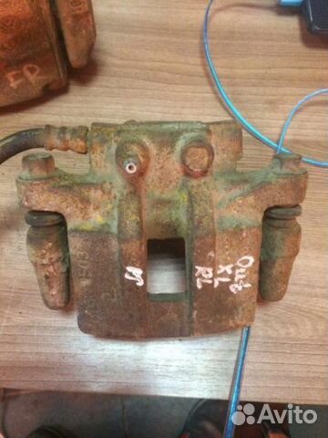 Суппорт тормозной задний левый Mitsubishi