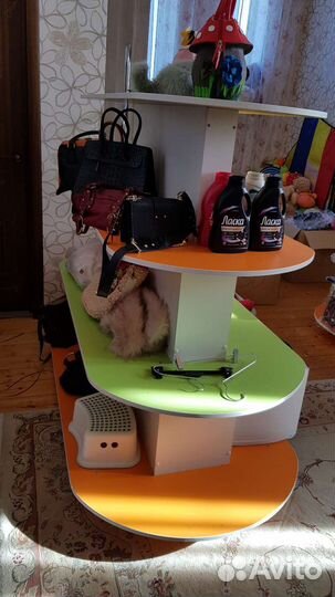 Стелажи островок полки разноцветные