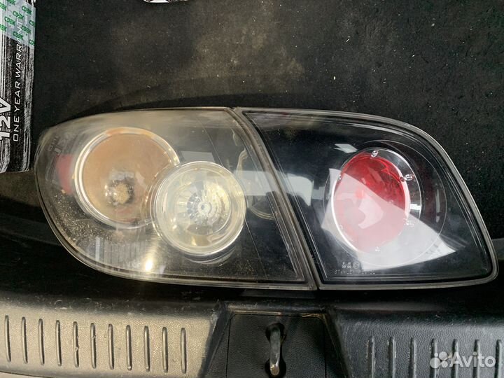 Задний левый фонарь Mazda 3 BK хетч