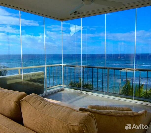 Безрамное раздвижное остекление