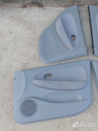 Дверные карты обшивки Киа Рио 1 дорестайлинг