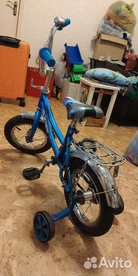 Детский четырехколëсный велосипед