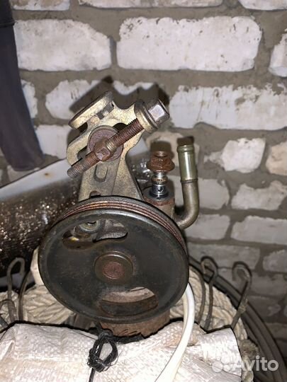 Насос гур на mazda demio 1999г