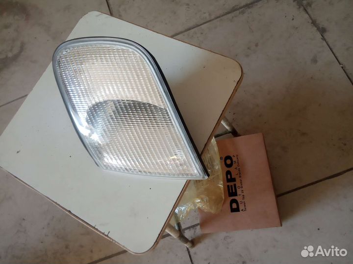 Поворотник левый новый Ауди А6 С4