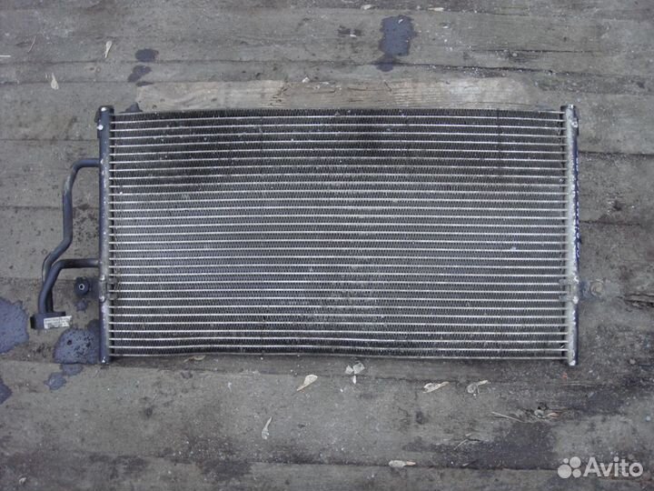 Радиатор кондиционера Mitsubishi Carisma