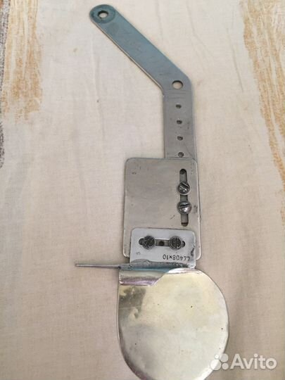 Приспособление для подгибки швейных изделий