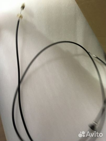 Трос открывания капота Mitsubishi Outlander XL