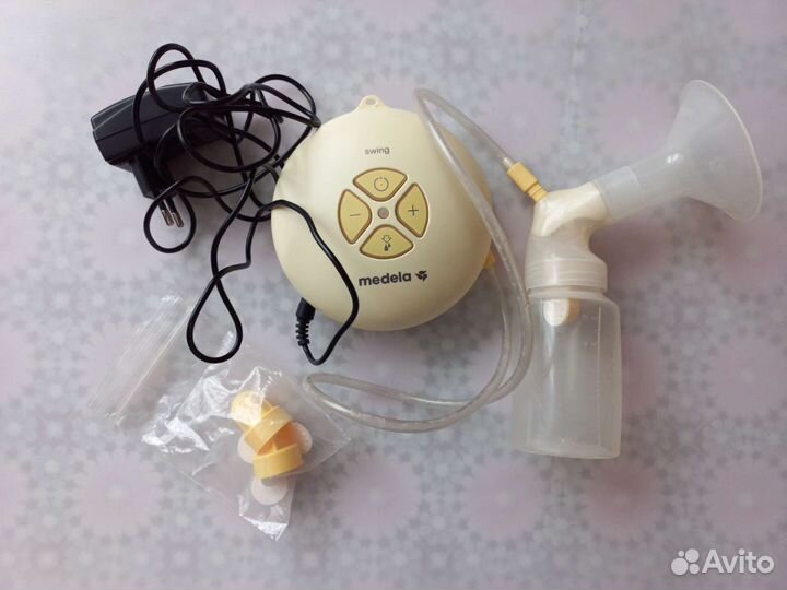 Молокоотсос Medela Swing+ручной Kari+бутылочки