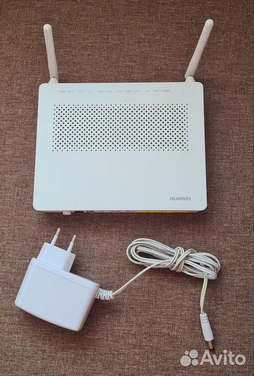 Оптический терминал роутер Ростелеком Huawei