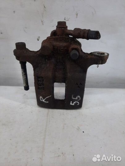 Суппорт тормозной задний правый Nissan X-Trail