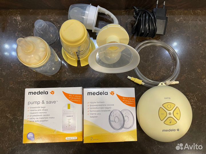 Молокоотсос medela электрический