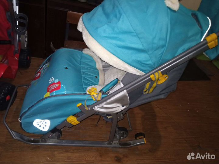 Детские санки коляска ника с колесами