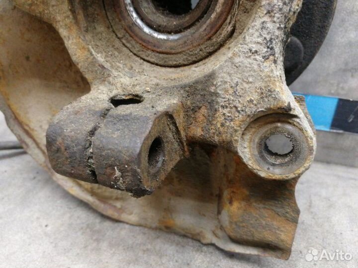 Кулак поворотный передний левый Mitsubishi Lancer