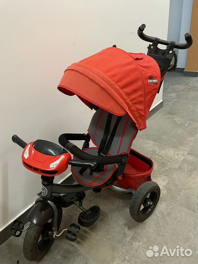 Трехколесный велосипед с ручкой