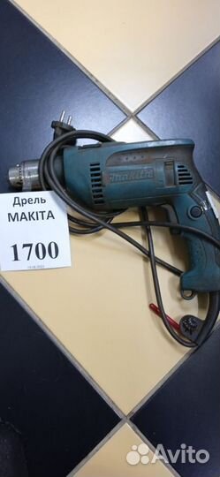 Ударная дрель Makita HP1640