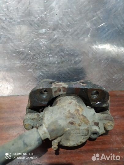 Суппорт тормозной передний левый Renault Fluence